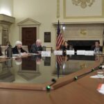 Warsh’s First Contested Meeting: What a July Hold and…